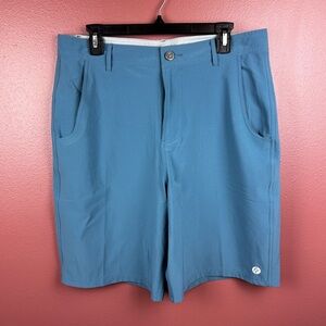 NWT Free Fly Men’s Hybrid Short 9.5 inch inseam color delta blue waist size 34